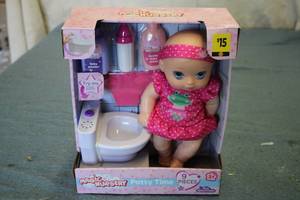 Magic nursery potty time doll...