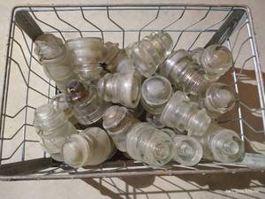 Metal Crate Full of Vintage Insulators