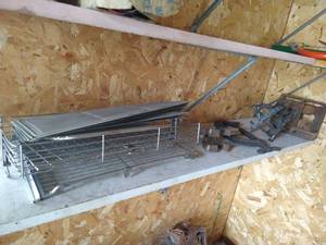 Shelf of Clamps, Grates, Etc