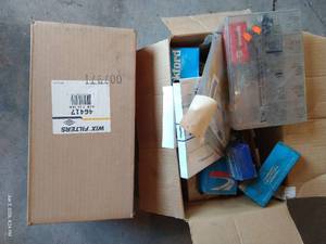 Box of NOS Auto Parts