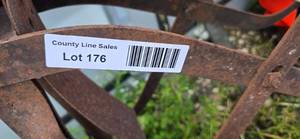 3 Antique Grinding Stone wheels with old metal frame