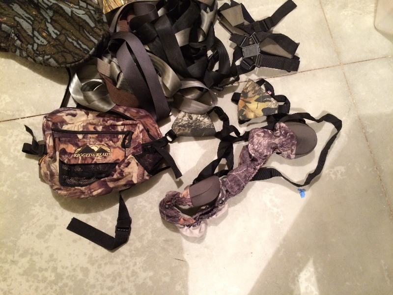 Large lot of hunting accessories - Gun and bow cases, safety belts, back packs, duffle bag, compound bow slings