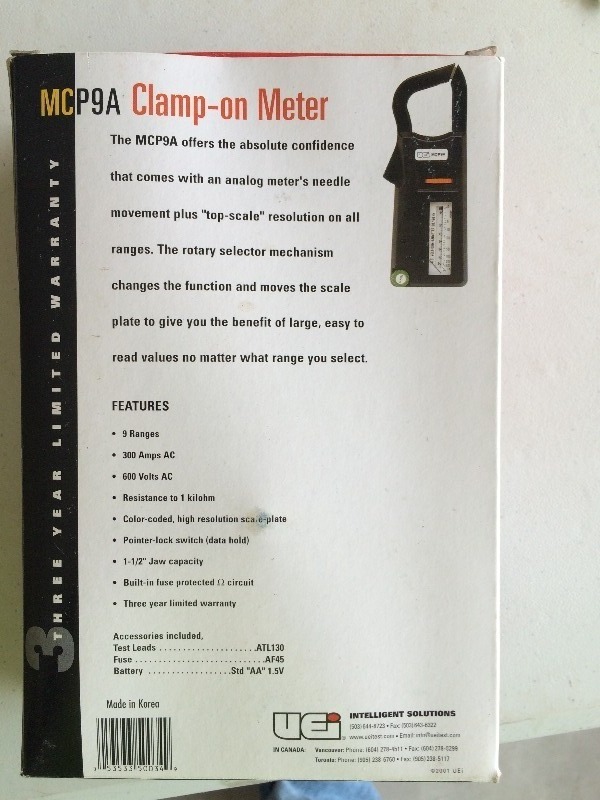 Clam On Meter - measures volts, ohms, amps  new in box