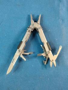 Gerber Multi-Plier 600 series tool, identified by its bead-blast stainless steel construction and sliding plier mechanism.