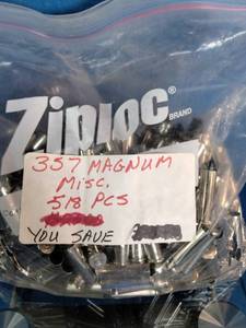 518 pieces of mixed, nickel-plated .357 Magnum shell casings intended for ammunition reloading.