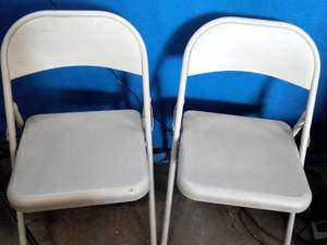 Metal folding chairs featuring a tubular metal frame