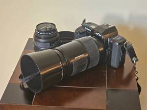 Olympus OM77 AF 35mm Film Camera with Zoom Lenses