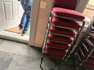 stack of 7 banquet chairs
