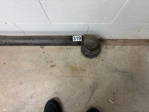 Long iron pipe foot rail for bar