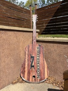 Large wooden guitar