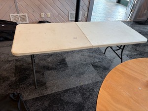 Foldable plastic white top table