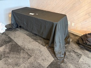 Multiple black linens for rectangle banquet tables