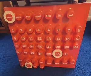 1970s Ring-A-Date Perpetual Wall Calendar Orange Plastic MCM Mod Decor