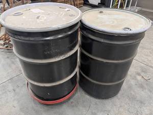 Pair of Steel Drums on Rolling Bases