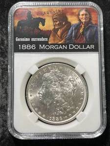 1886 US MORGAN SILVER DOLLAR SLABBED