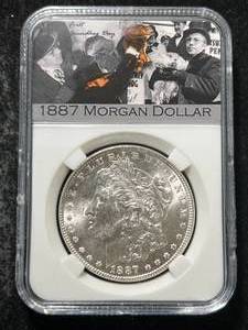 1887 US MORGAN SILVER DOLLAR SLABBED
