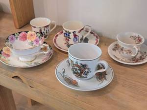 Tea Cups (x5) and Saucers (x4)
