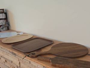 (2) Wood Cutting Boards, (1) Ceramic Cutting Board, (2) Wood Serving Trays