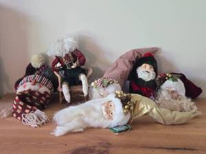 (4) Santa Head Ornaments, (1) Snowman Door Know Hanger, (1) Santa in a Chair Figure