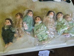 Lot of (7) Porcelain Dolls