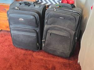 Lot of (2) Ricardo Rolling Suitcases