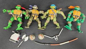Vintage Teenage Mutant Ninja Turtles Figure Lot With Accessories (Lot of 4)