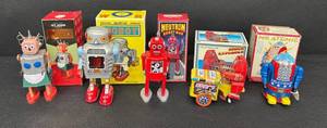 Noteworthy Lot of 5 Wind-Up Robot Mixed Lot (St. John, Neutron, Space Explorer, Mr. Atomic)