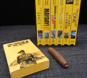 NATIONAL GEOGRAPHY VHS TAPES, 1 WAR BOOK AND FAKE CIGAR