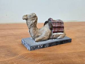 Resin Seated Camel with Striped Blanket