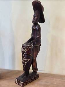Haitian Handcarved Wooden Folk Art Depicting a Man in Hat Playing a Drum
