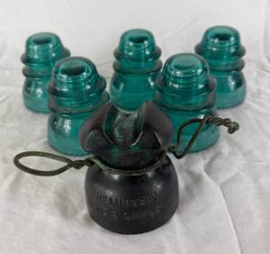 Five Hemingray No 42 Vintage Aqua-Blue Glass Insulators and One Hemingray 112 Cable Insulator