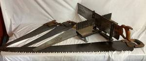 Three Antique E.C. Atkins Handsaws, 1 Disston Antique Saw, 1 Vintage 27 Disston Saw in Miter Box