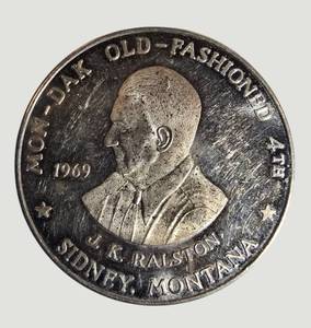 1969 J.K. Ralston Sidney Montana Trade Token  One Dollar  Exp. July 7, 1969