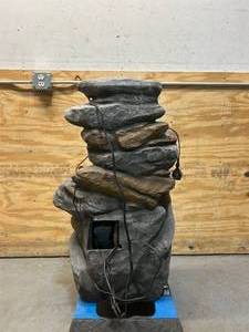 ^ Outdoor Cascading Water Fountain with Natural Looking Stone Waterfall