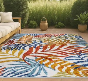 Tropics Palm Leaves CreamOrange IndoorOutdoor 5 ft. x 8 ft. Area Rug