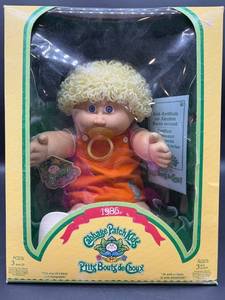 Cabbage Patch Kid - Coleco - Canada - French - Shag - Lemon Hair - Blue Eyes - Pacifier & Dimples - Boy - MIB