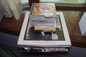 Assorted CDs and Vinyl Records