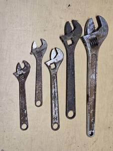 Adjustable wrenches, various sizes and brands including Diamond