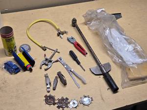 Lot of Automotive and Repair Tools Including Torque Wrench, Rubber Patch Kit, and Valve Tools