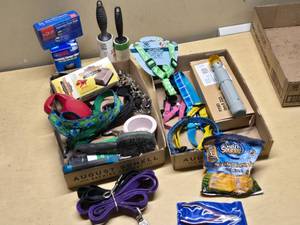 Pet supplies and aquarium items including dog harnesses, aquarium filter, and accessories