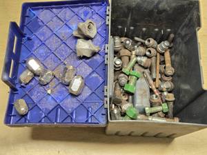 Lot of miscellaneous bolts and luig nuts in a storage box
