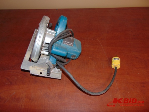 lot 10 image: Makita 7-14 Saw