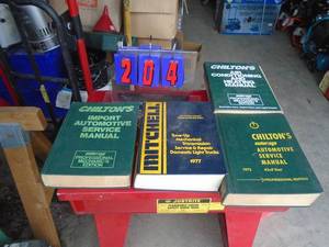 4 automotive manuals. As shown.