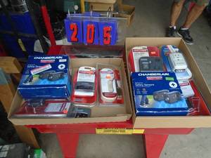 2 flats of garage door opener & parts. As shown.