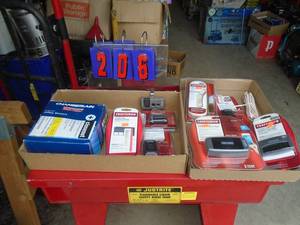 2 flats of garage door opener & parts. As shown.