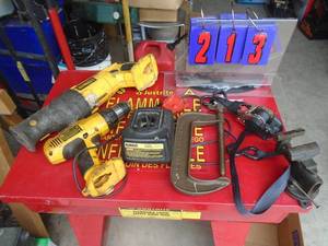 2 Dewalt tools & charger with misc tools. As shown.