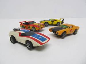 Estate Lot of 4 Vintage Slot Cars