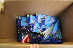 Box of USA party items...