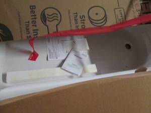 Americast oright drain tub...