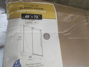 Glass shower door with frame...